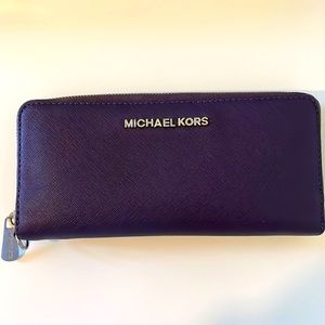 Plum Michael Kors Continental Wallet. NO WRIST STRAP